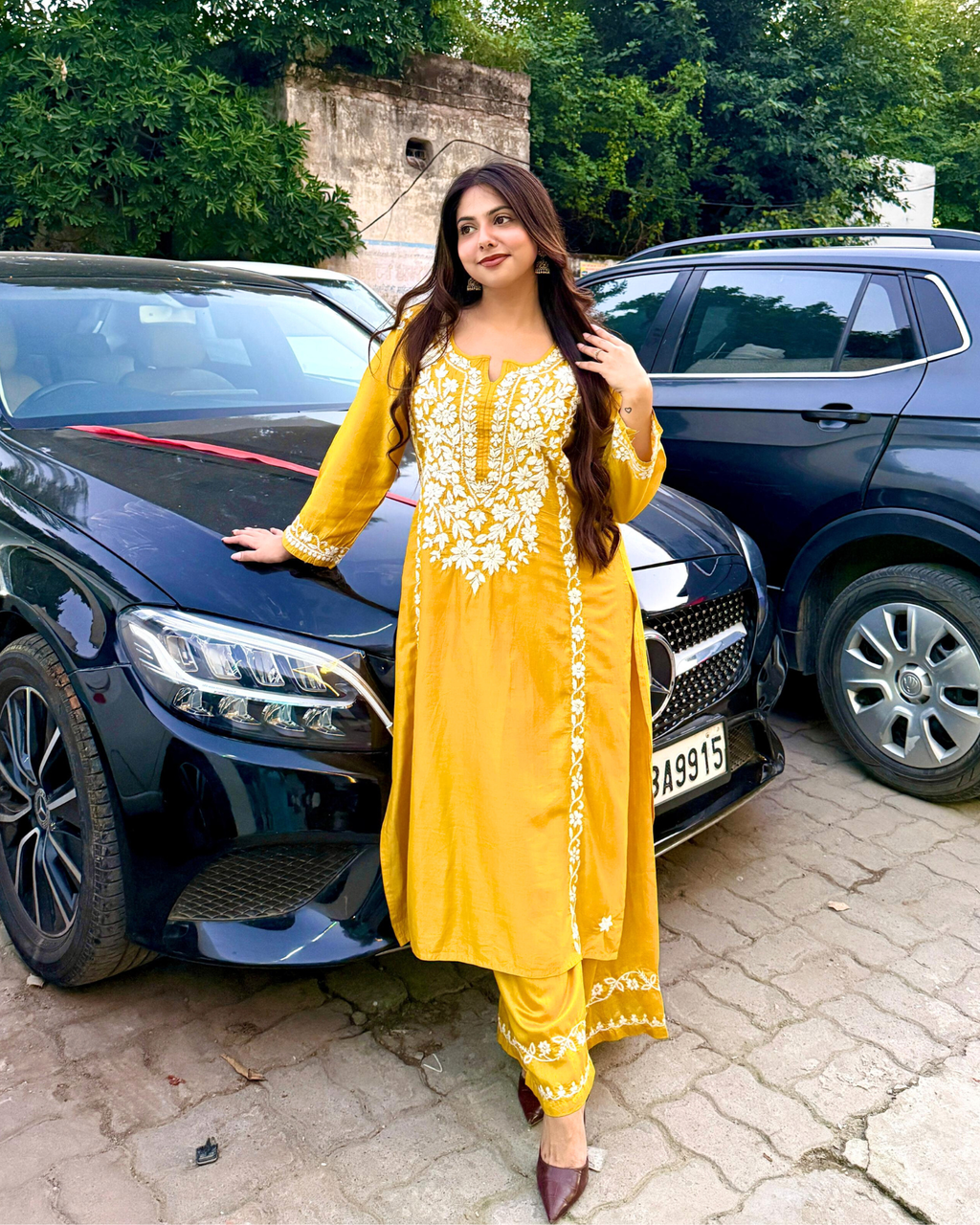 Side view showing ALIA silk chikankari kurta and matching plazo co-ord.