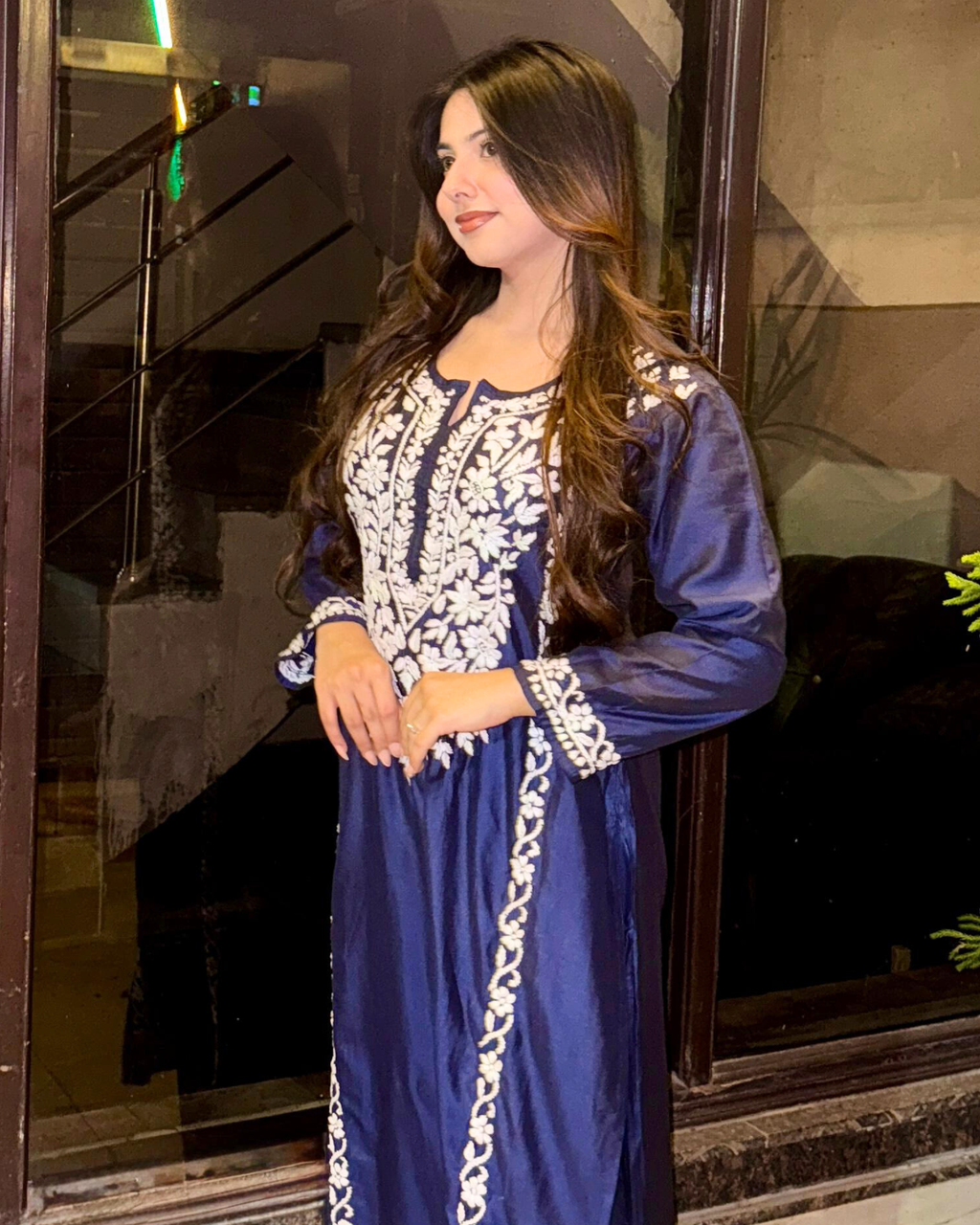 Side view showing ALIA straight-fit silk chikankari kurta and matching plazo co-ord.