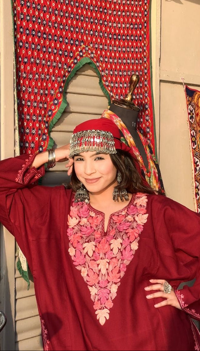 Front view of ISHREEN Kashmiri pheran woolen winter kurta for ladies in maroon.