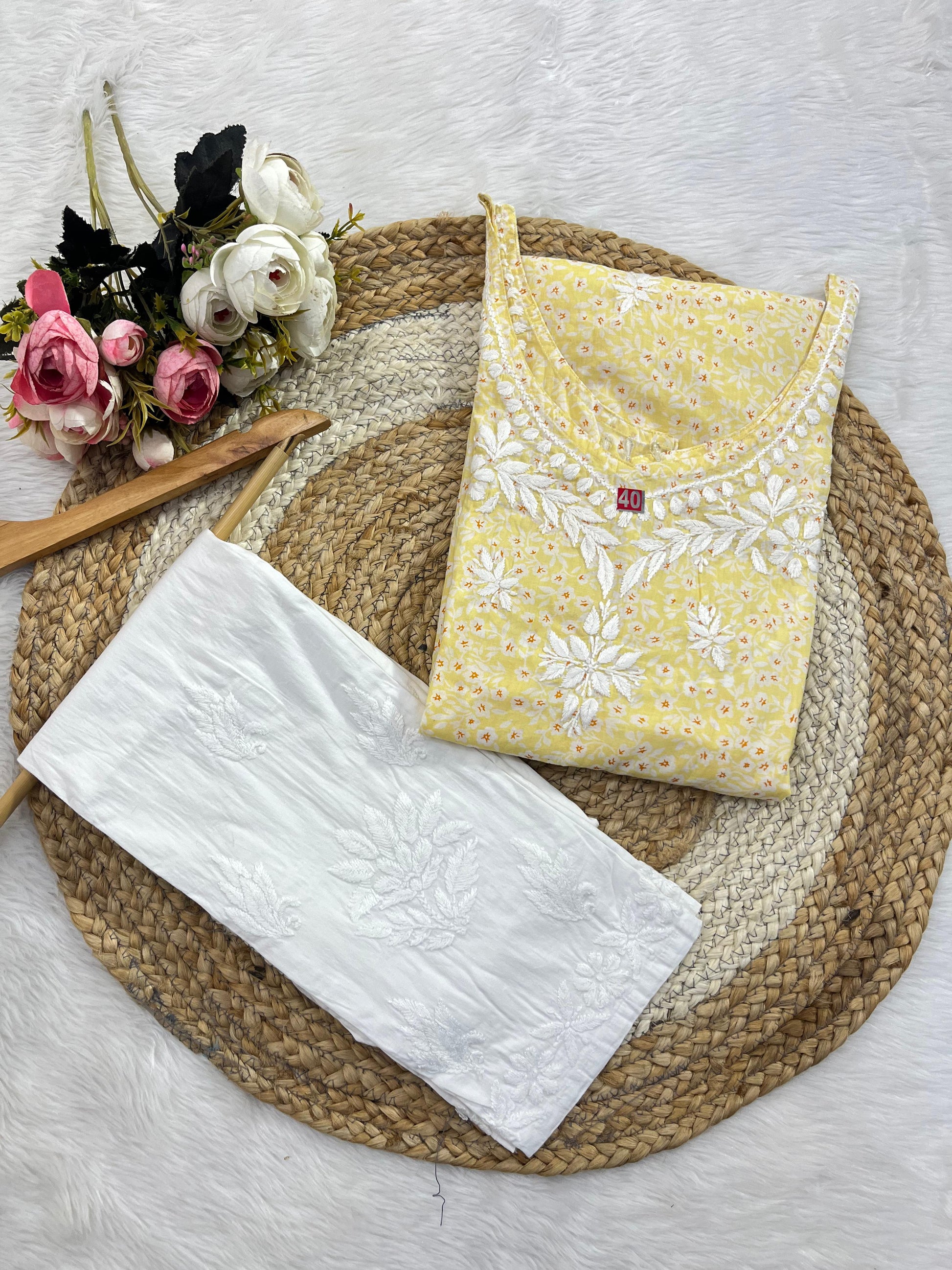 Close-up of Chikankari embroidery on mul mul fabric of Butter YELLOW Ishani  Mul Mul Chikankari kurta